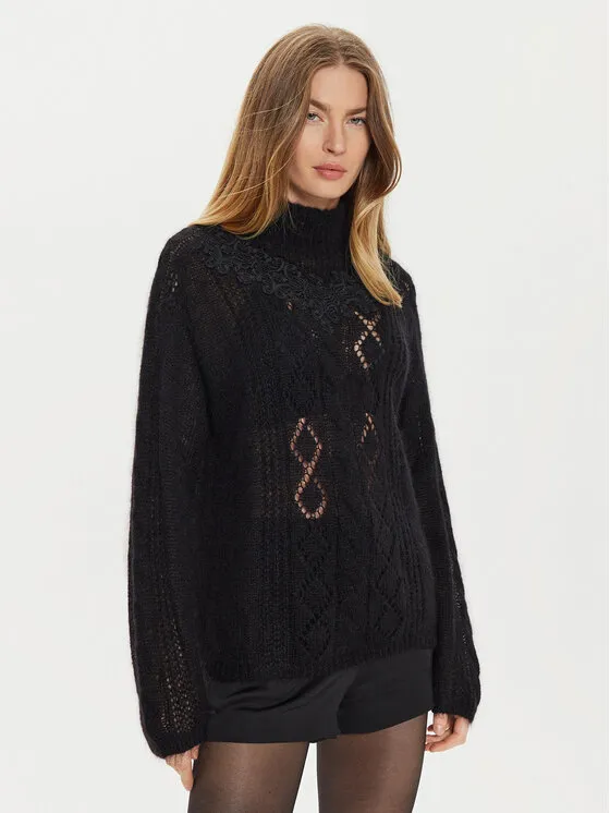 Rollkragenpullover · Schwarz · Relaxed Fit