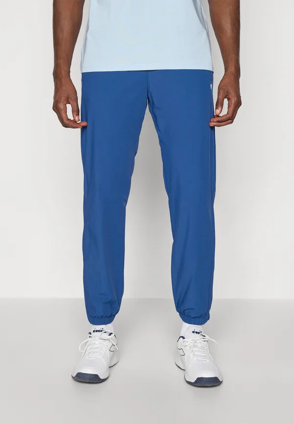 ACE TRACK PANTS - Tracksuit bottoms - estate blue