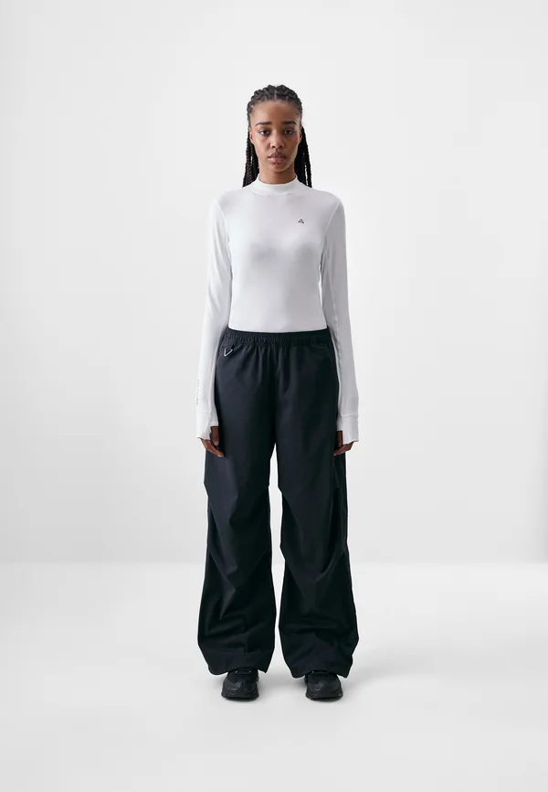 ACTIVITORIUM PANT - Tracksuit bottoms - black