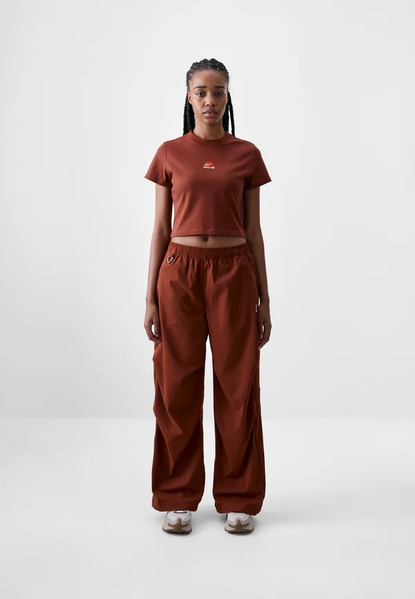 ACTIVITORIUM PANT - Tracksuit bottoms - cinnamon/picante red/summit white
