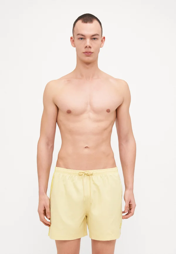 ADIC - Swimming shorts - powder yellow