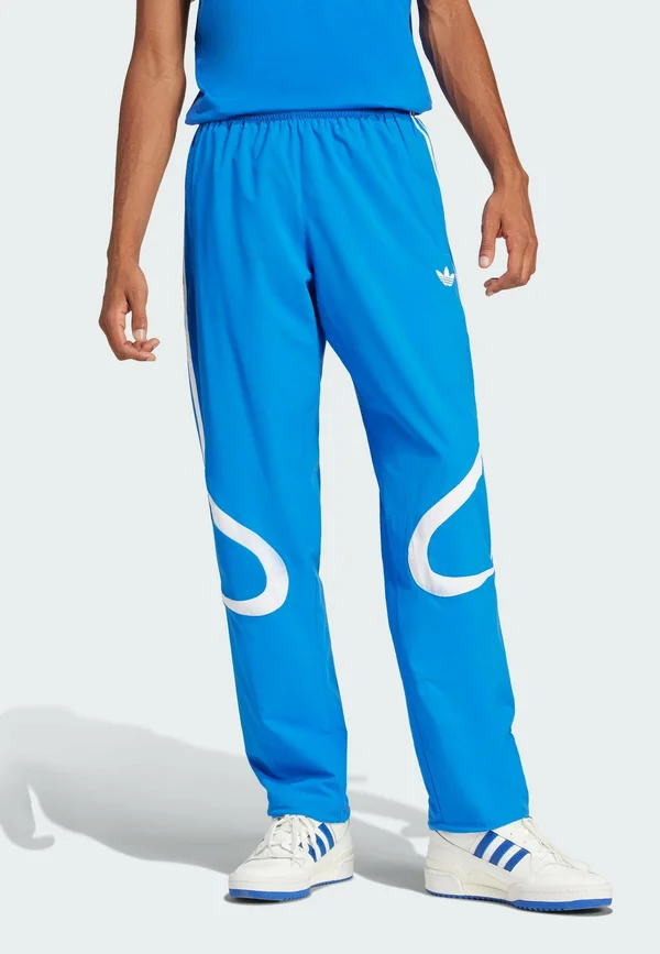 ADICOLOR TEAMGEIST TRACK - Tracksuit bottoms - blue   white