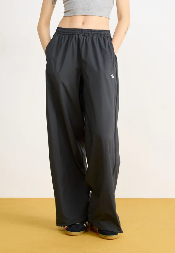 ADILENIUM SEASONAL 3 ZIP TRACK WIDE - Tracksuit bottoms - black