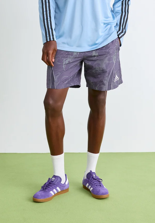 ADILENIUM - Tracksuit bottoms - trace purple