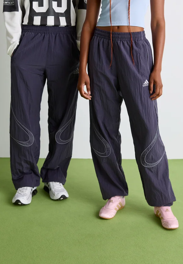 ADILENIUM UNISEX - Tracksuit bottoms - trace purple