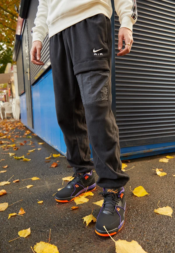 AIR WINTER PANT - Cargo trousers - black/white