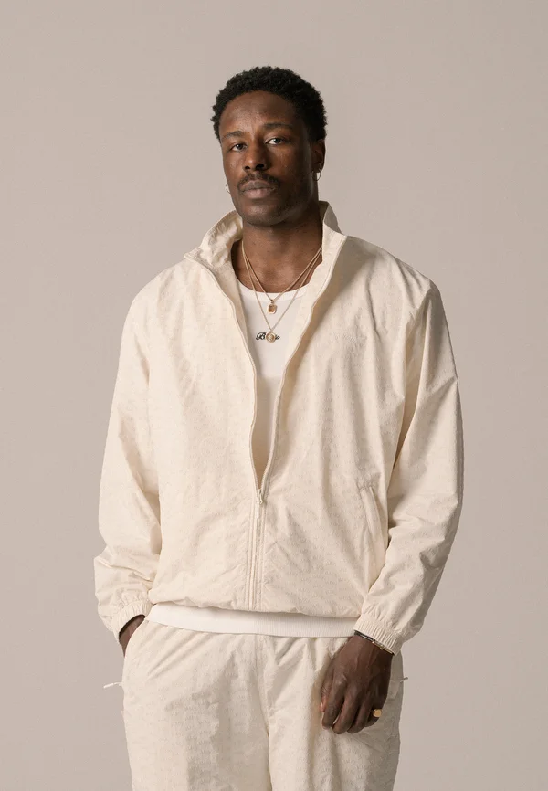 ALLOVER TRACK JACKET UNISEX - Training jacket - antique white