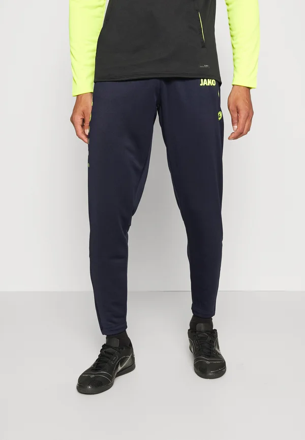 ALLROUND - Tracksuit bottoms - marine/neongelb