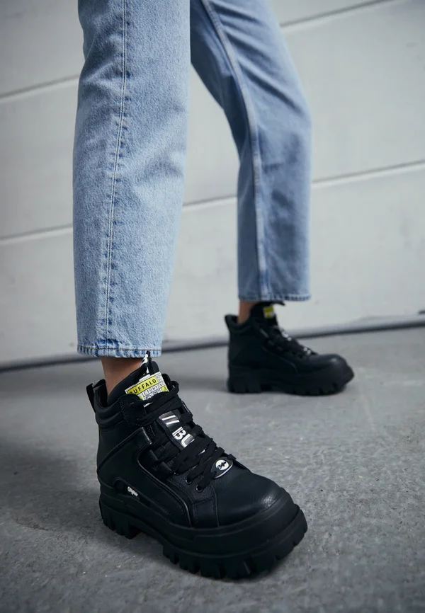 ASPHA MID - Platform ankle boots - black