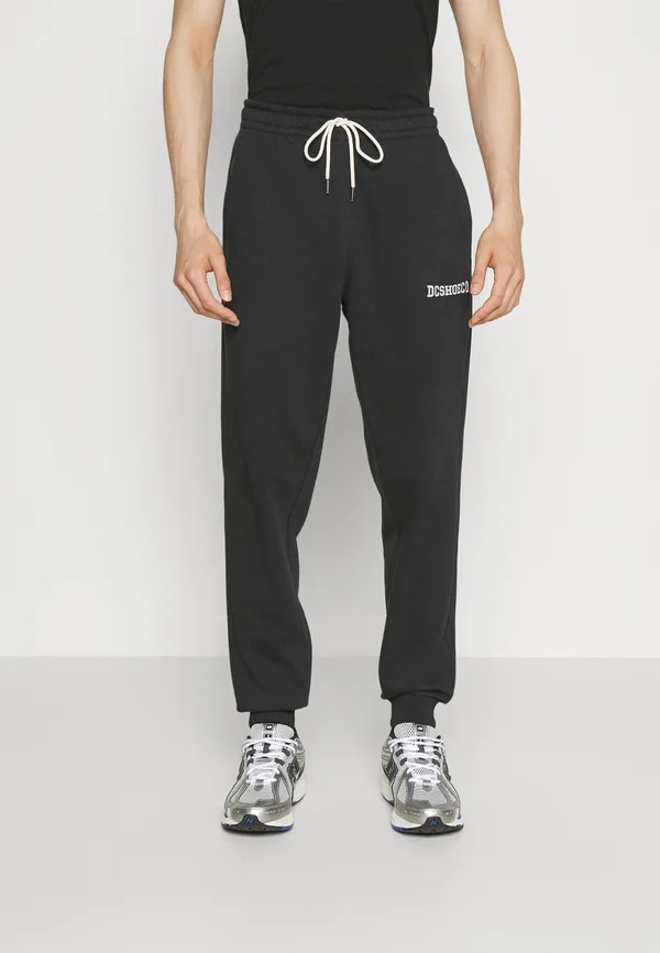 BASELINE - Tracksuit bottoms - black