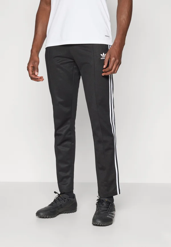 BECKENBAUER - Tracksuit bottoms - black/white
