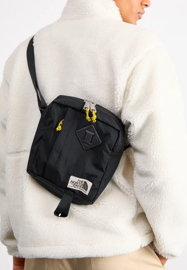 BERKELEY CROSSBODY UNISEX - Cross body bag - black/mineral gold
