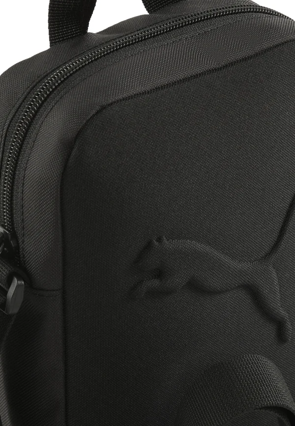 BUZZ PORTABLE - Cross body bag - puma black