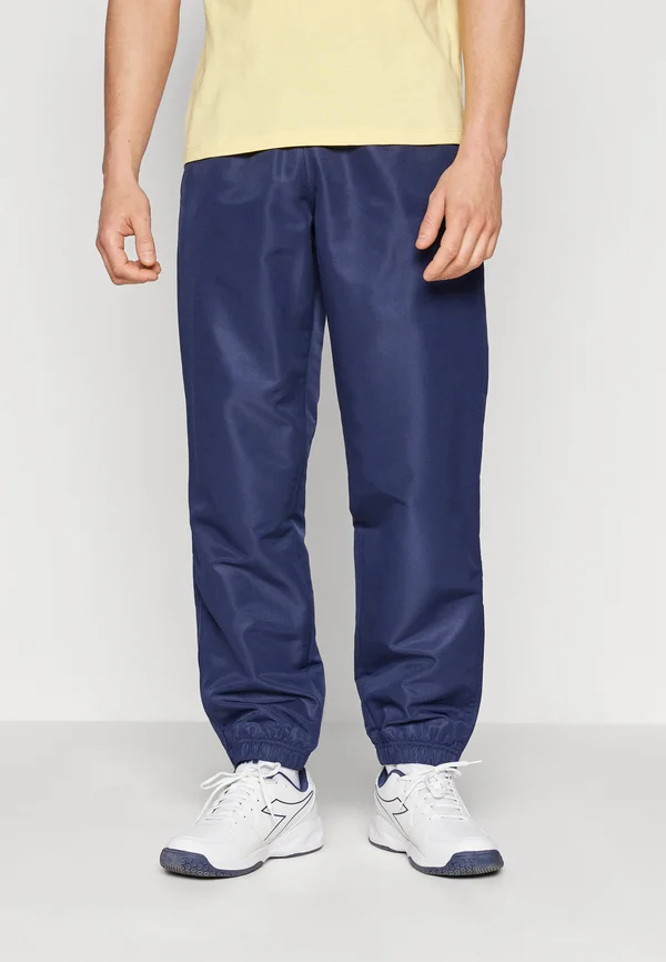 CARSON PANTS - Tracksuit bottoms - navy/white