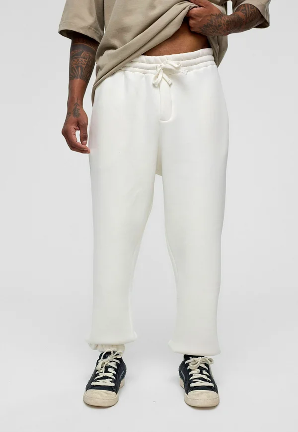 CLAUS - Tracksuit bottoms - ecru