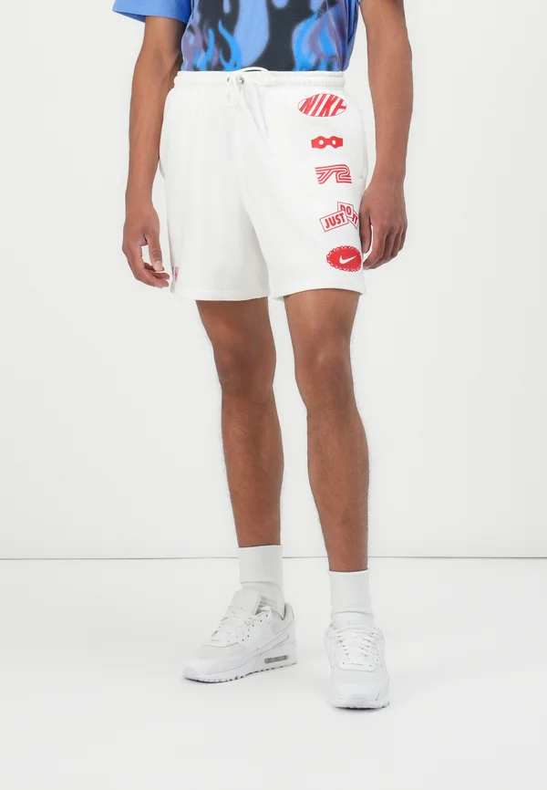 CLUB FLOW CYCLE - Tracksuit bottoms - white/university red
