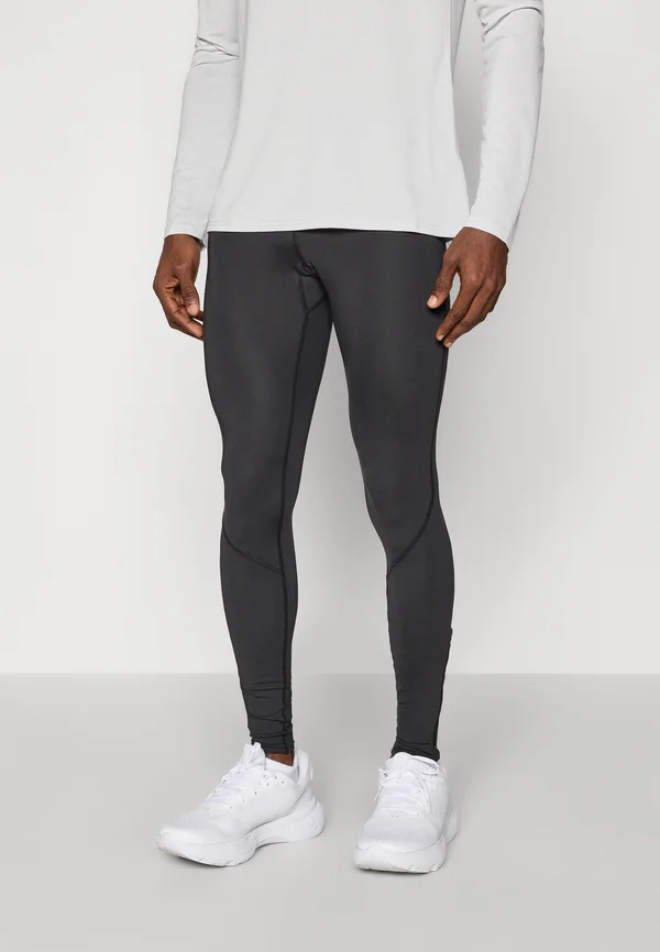 CORE IMPULSE LONG - Running tights - black