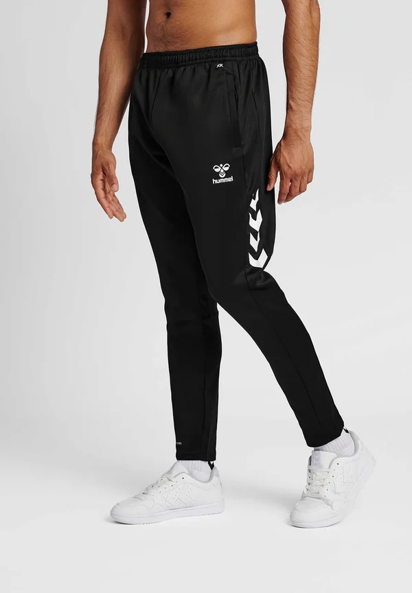 CORE - Tracksuit bottoms - black