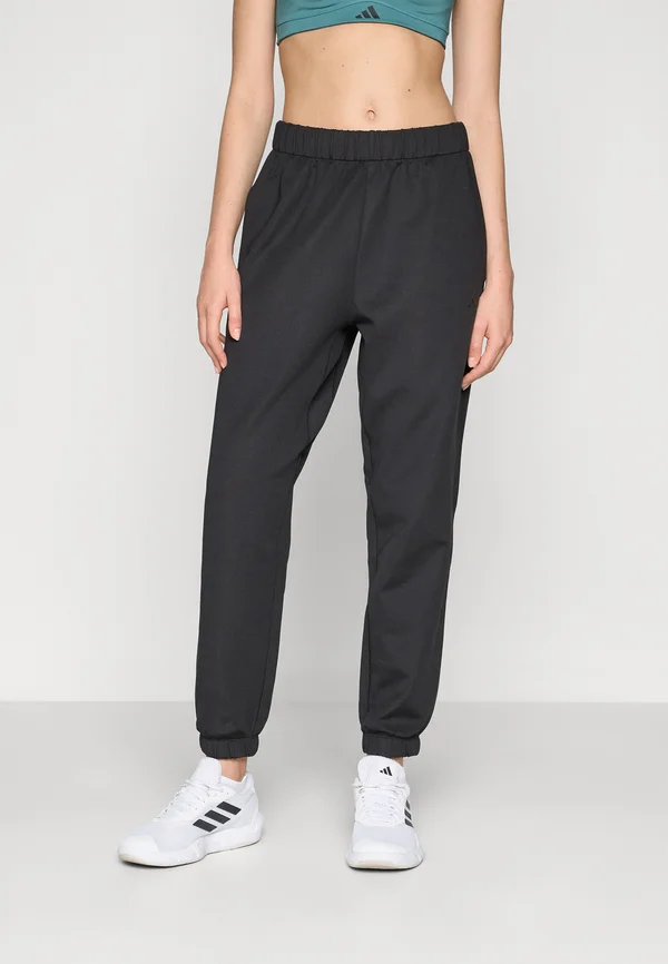 CUFF  - Tracksuit bottoms - black