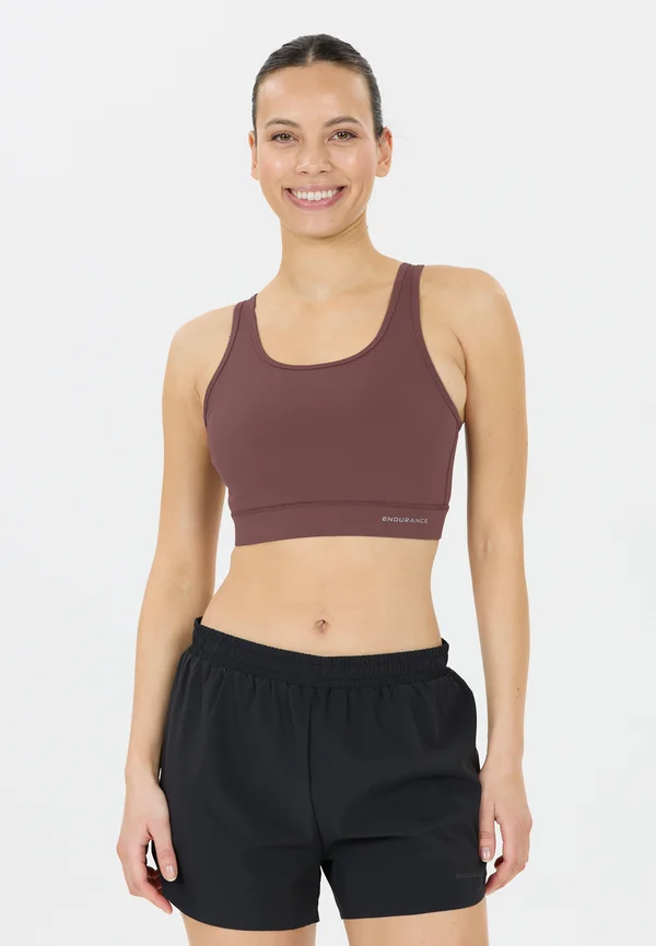 CYNTHIAN - Medium support sports bra - huckleberry
