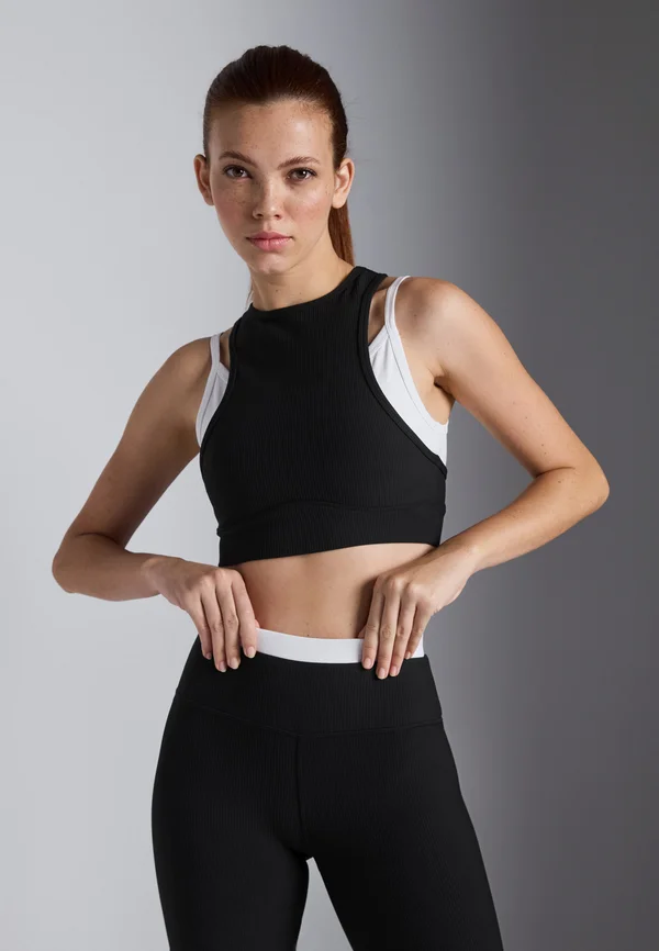 DOUBLE LAYER SLEEVELESS CONTRAST TOP - Light support sports bra - black