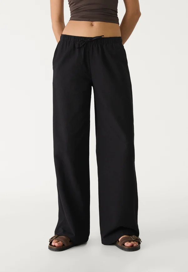 DRAWSTRING - Trousers - black