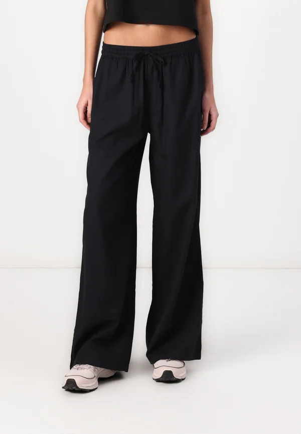 DROPPING IN PANT - Trousers - black