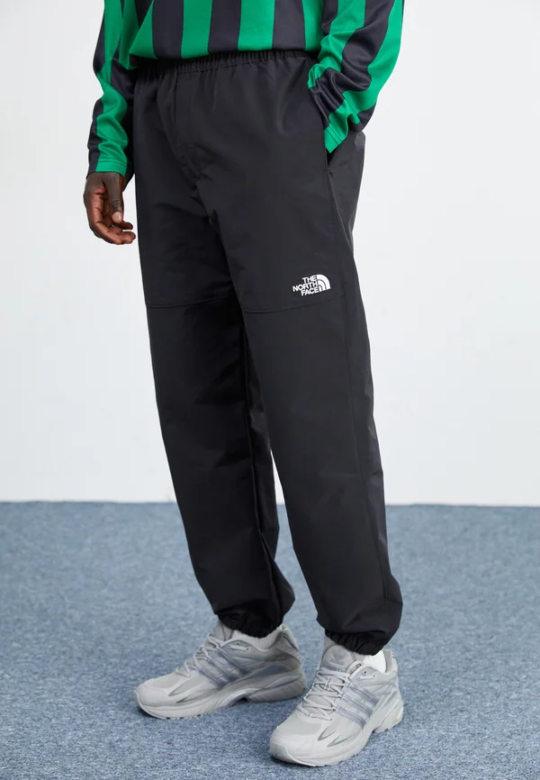 EASY WIND PANT - Tracksuit bottoms - black
