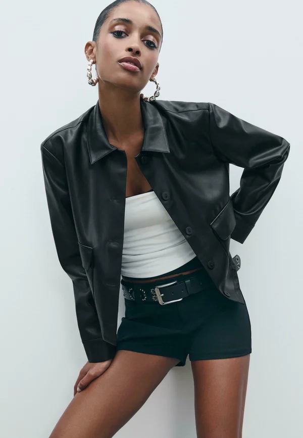 EFFECT WITH POCKETS - Faux leather jacket - black