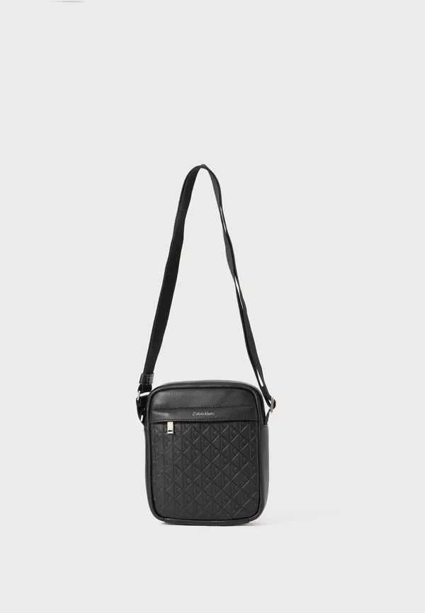 EMBLEM EMBOSS REPORTER - Cross body bag - black