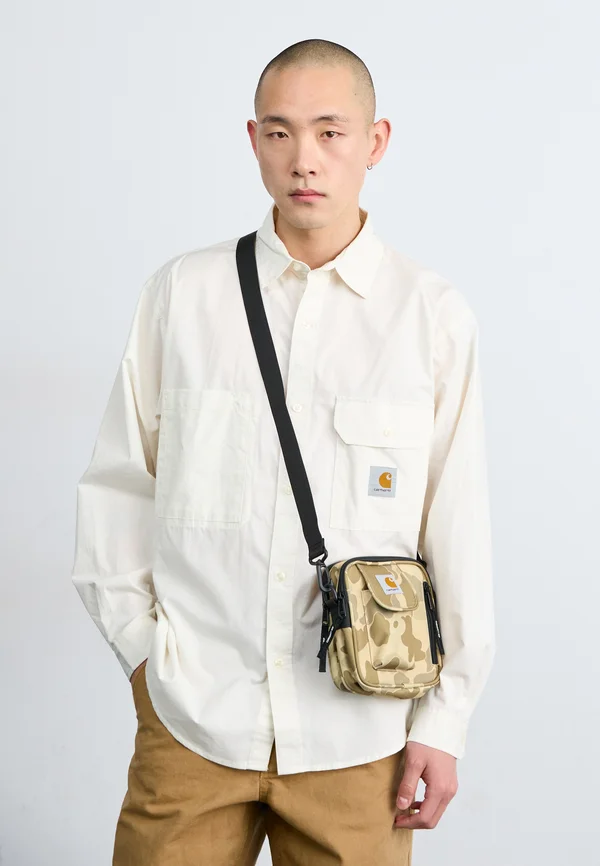 ESSENTIALS BAG SMALL UNISEX - Cross body bag - duck/desert