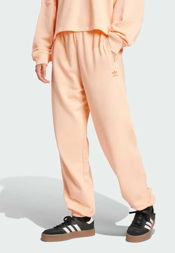 ESSENTIALS LOOSE - Tracksuit bottoms - glow pink
