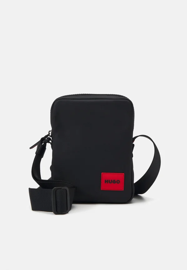 ETHON UNISEX - Cross body bag - black