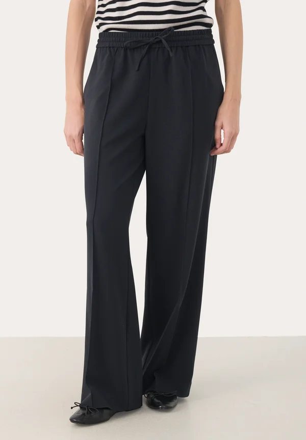 EVALYNNA - Trousers - black