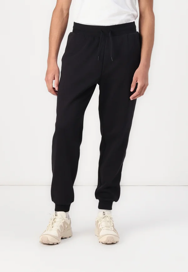 FINE REGULAR TAPERED - Tracksuit bottoms - black