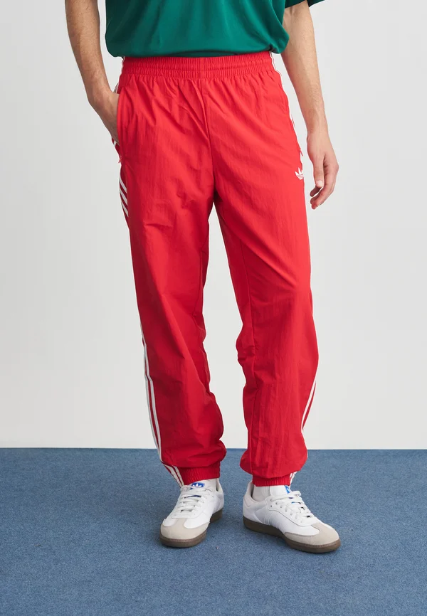 FIREBIRD - Tracksuit bottoms - better scarlet