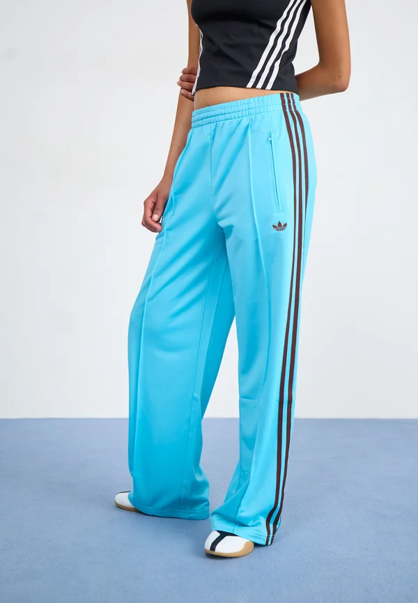 FIREBIRD - Tracksuit bottoms - blue glow/auburn