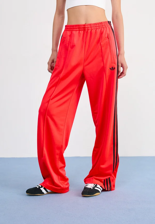 FIREBIRD - Tracksuit bottoms - lucid red/black