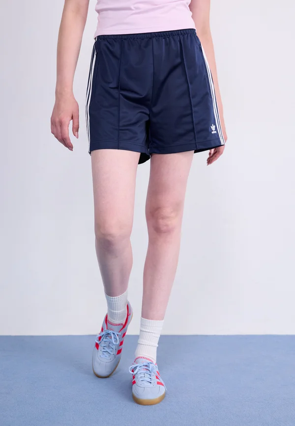 FIREBIRD - Tracksuit bottoms - night indigo/white