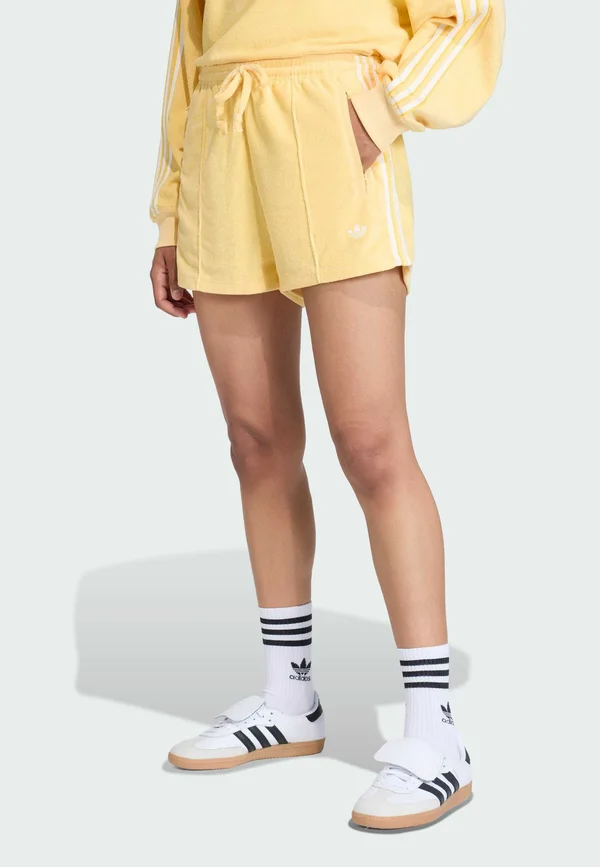 FIREBIRD - Tracksuit bottoms - orange tint