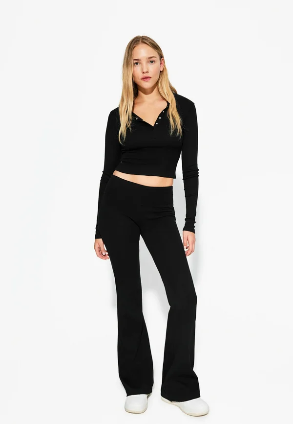 FLARED  - Trousers - black