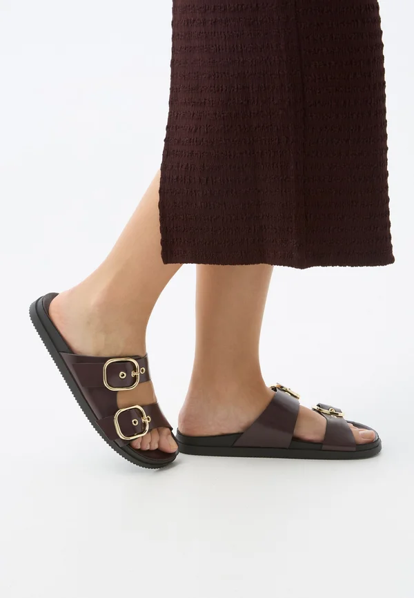 FLAT WITH BUCKLES - Mules - dark red