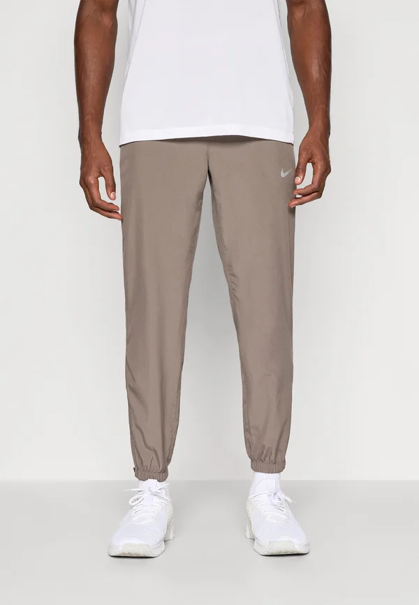 FORM PANT - Tracksuit bottoms - cave stone/black/reflective silver-coloured