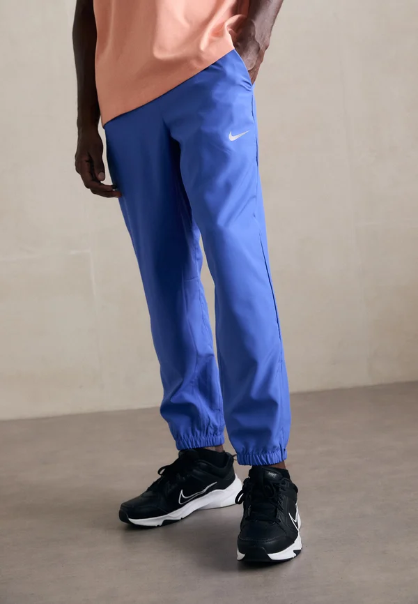 FORM PANT - Tracksuit bottoms - comet blue/black