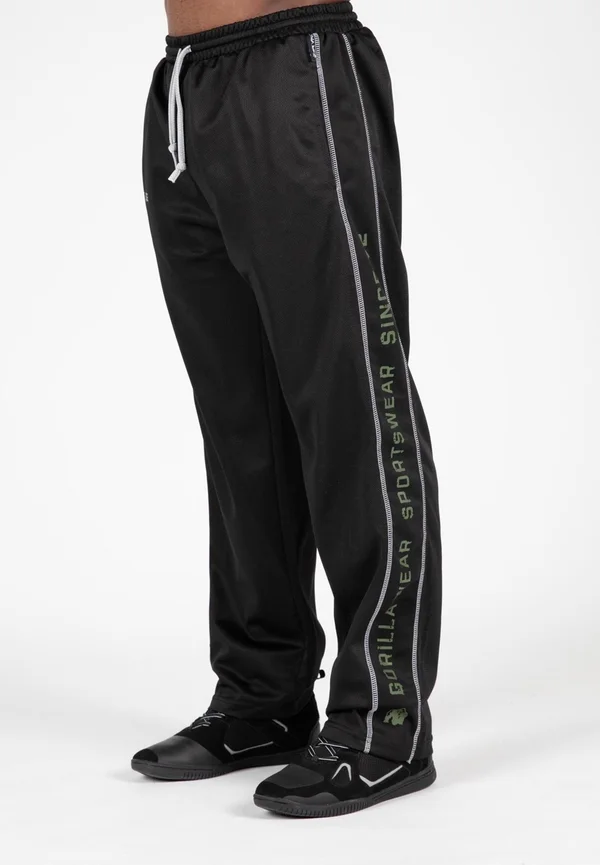 FUNCTIONAL  - Tracksuit bottoms - green