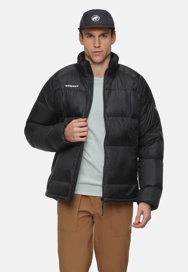 GLACIER GLOW IN - Down jacket - black