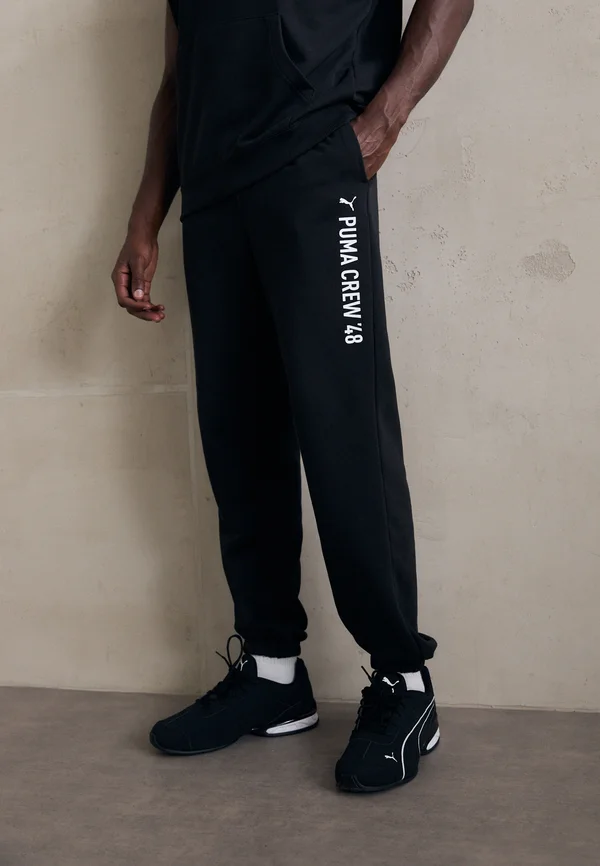 GRAPHIC JOGGER - Tracksuit bottoms - black