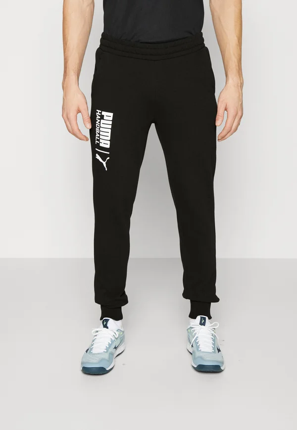 HANDBALL - Tracksuit bottoms - black