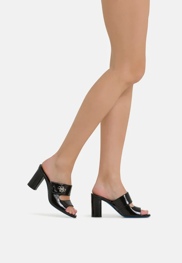 Heeled mules - black