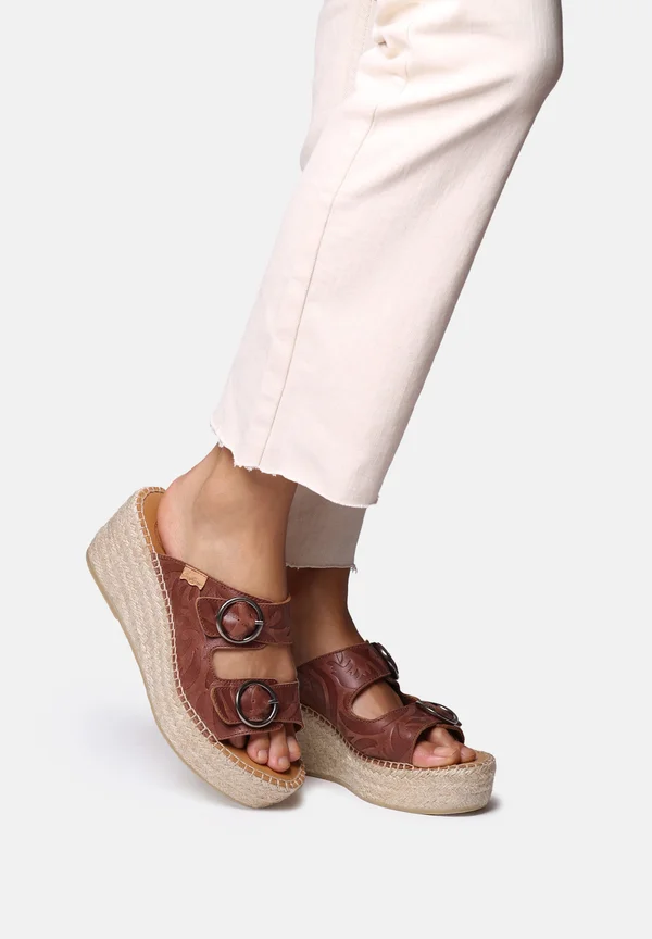 Heeled mules - cuiro